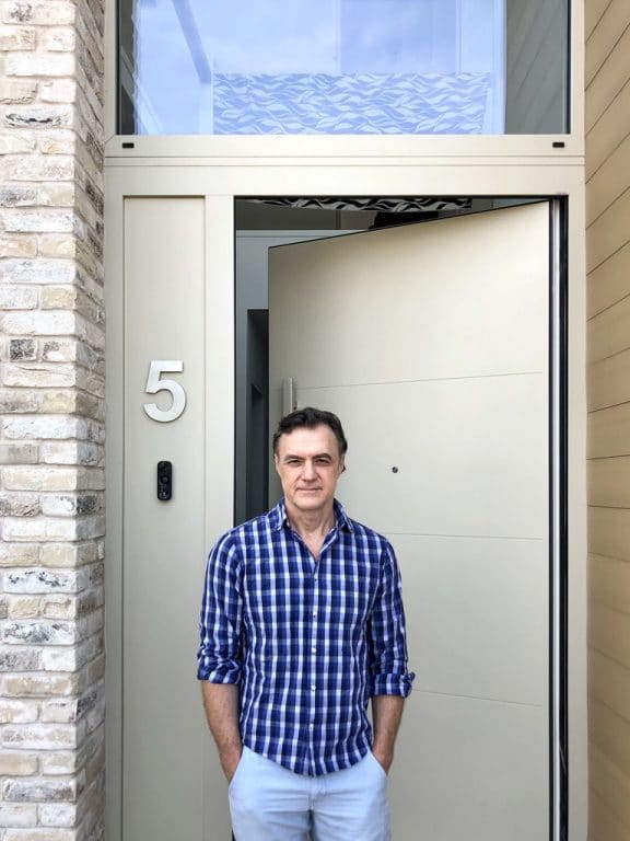 robert outside his home